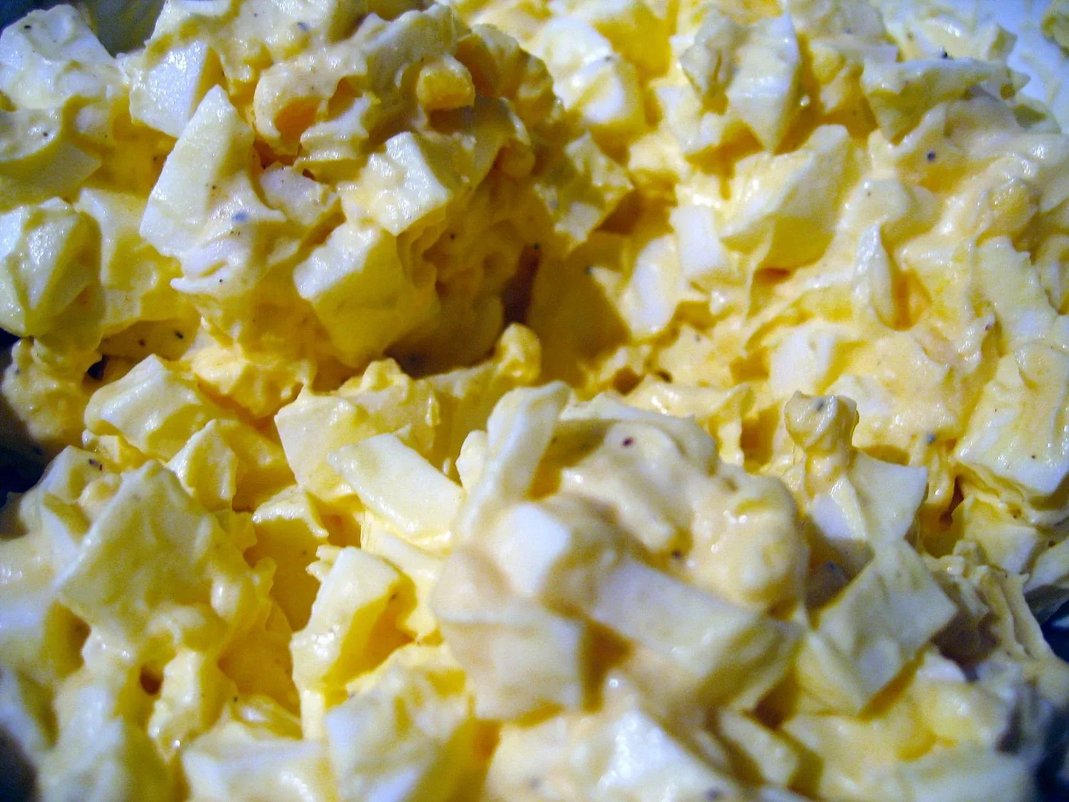 Egg salad spread on a bagel