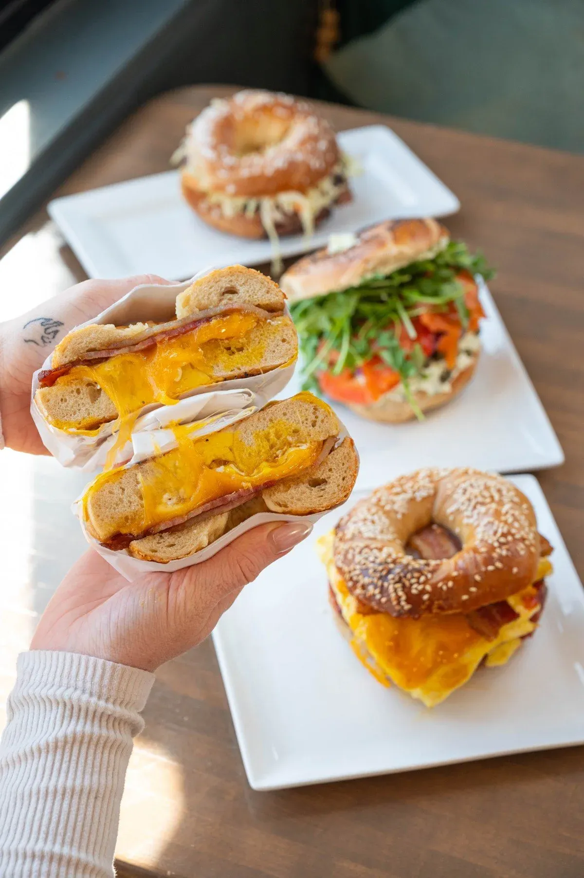 Variety of custom bagel creations at Gotham Bagels