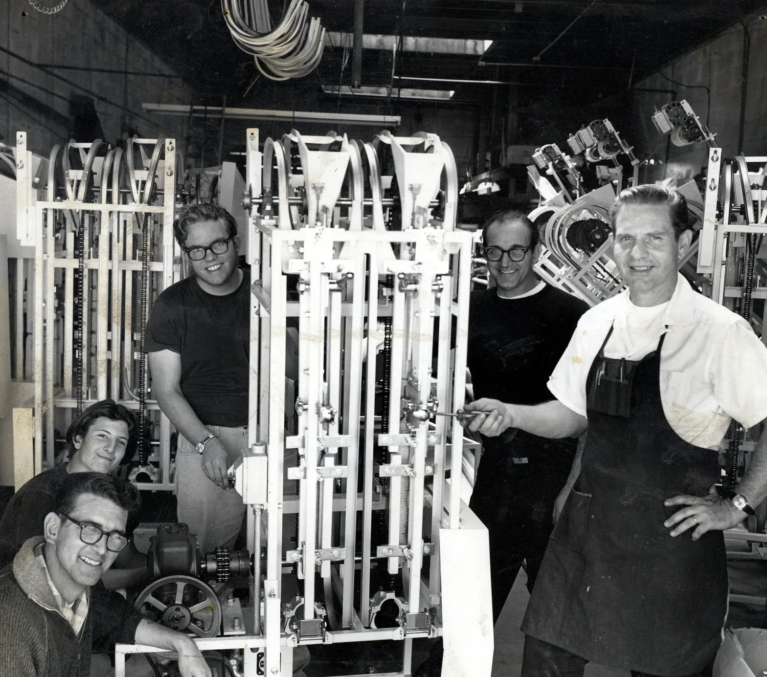 Daniel Thompson with his bagel machine invention