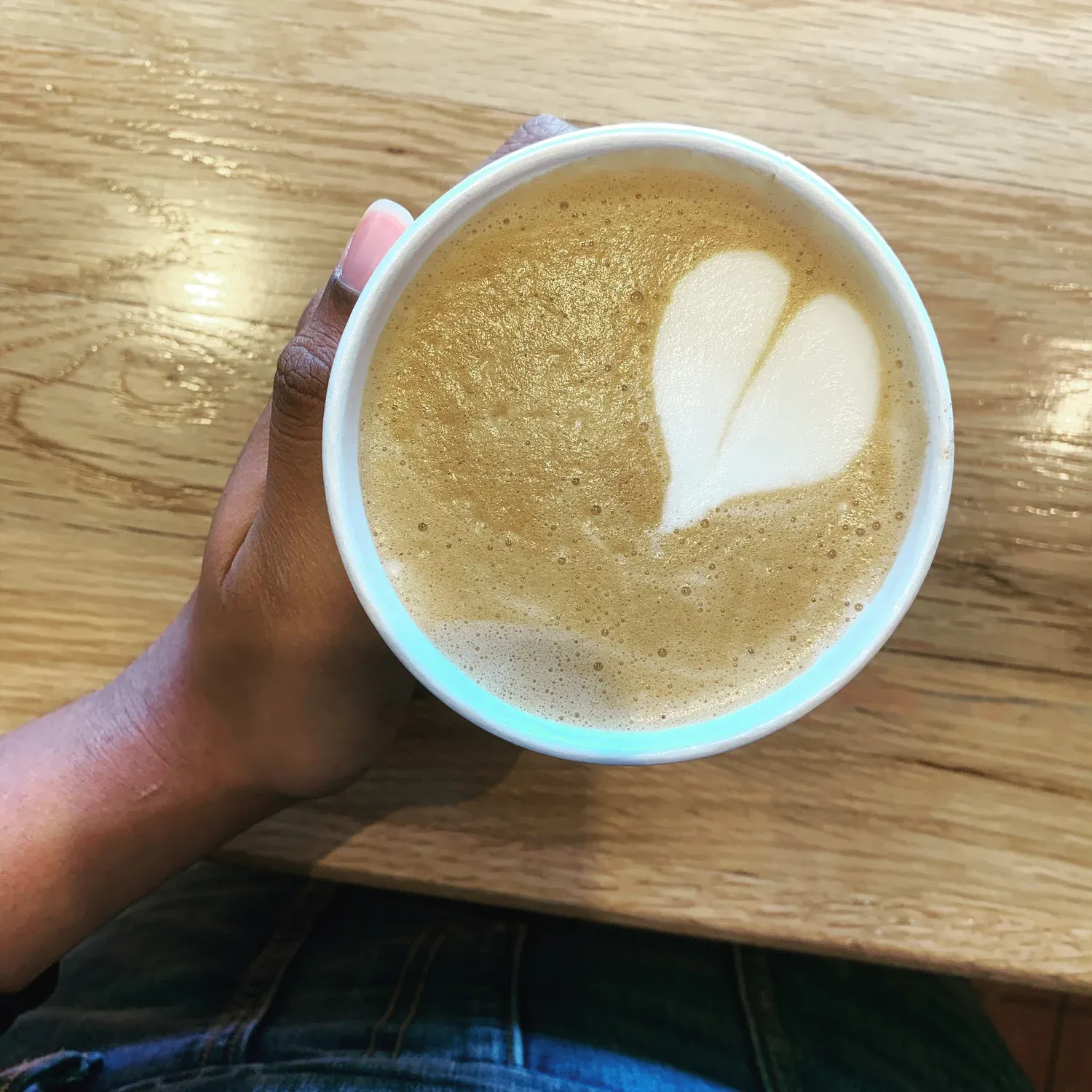 Heart-shaped latte art in a cup