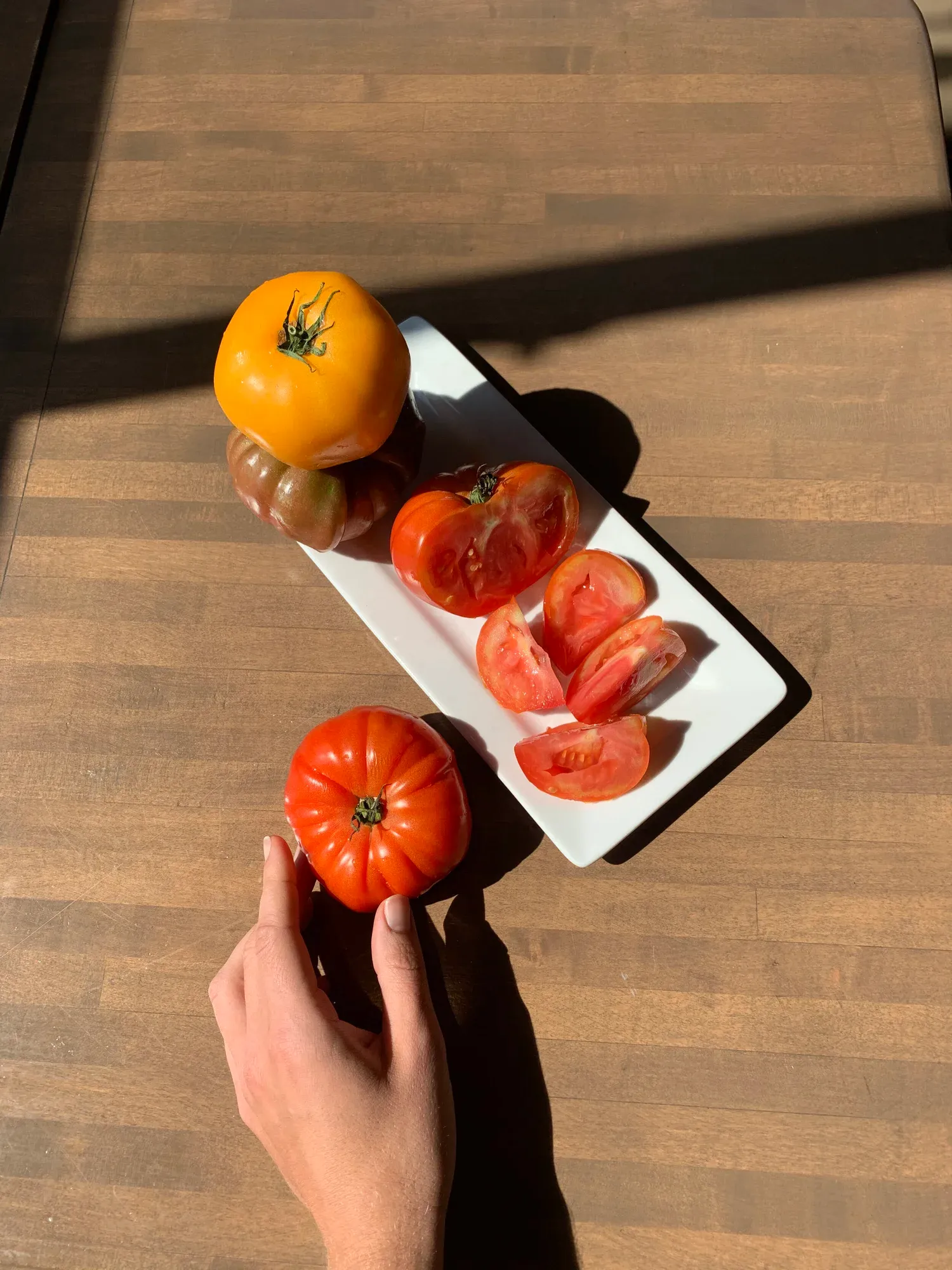 Fresh heirloom tomatoes on a surface