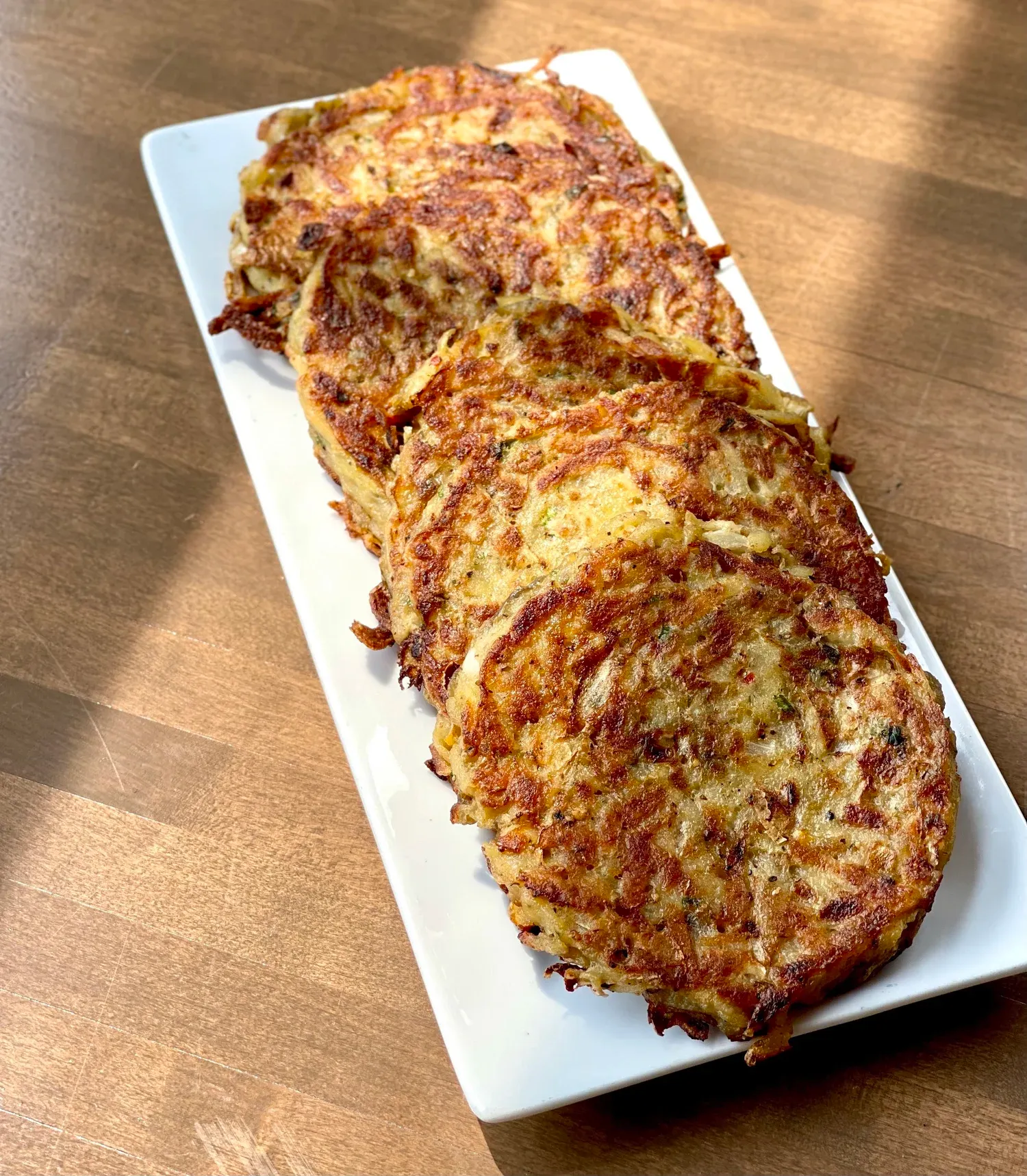 Golden fried potato latkes close-up