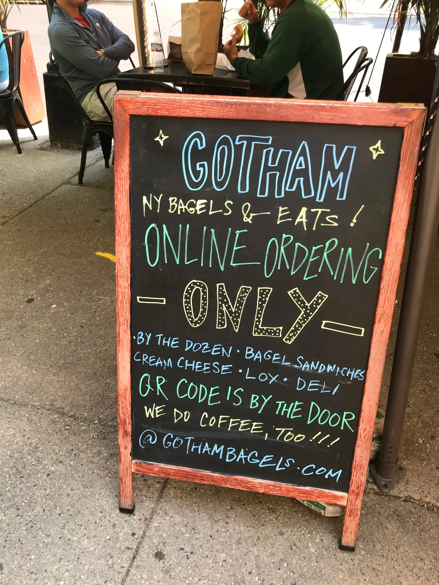 Online ordering signage at Gotham Bagels